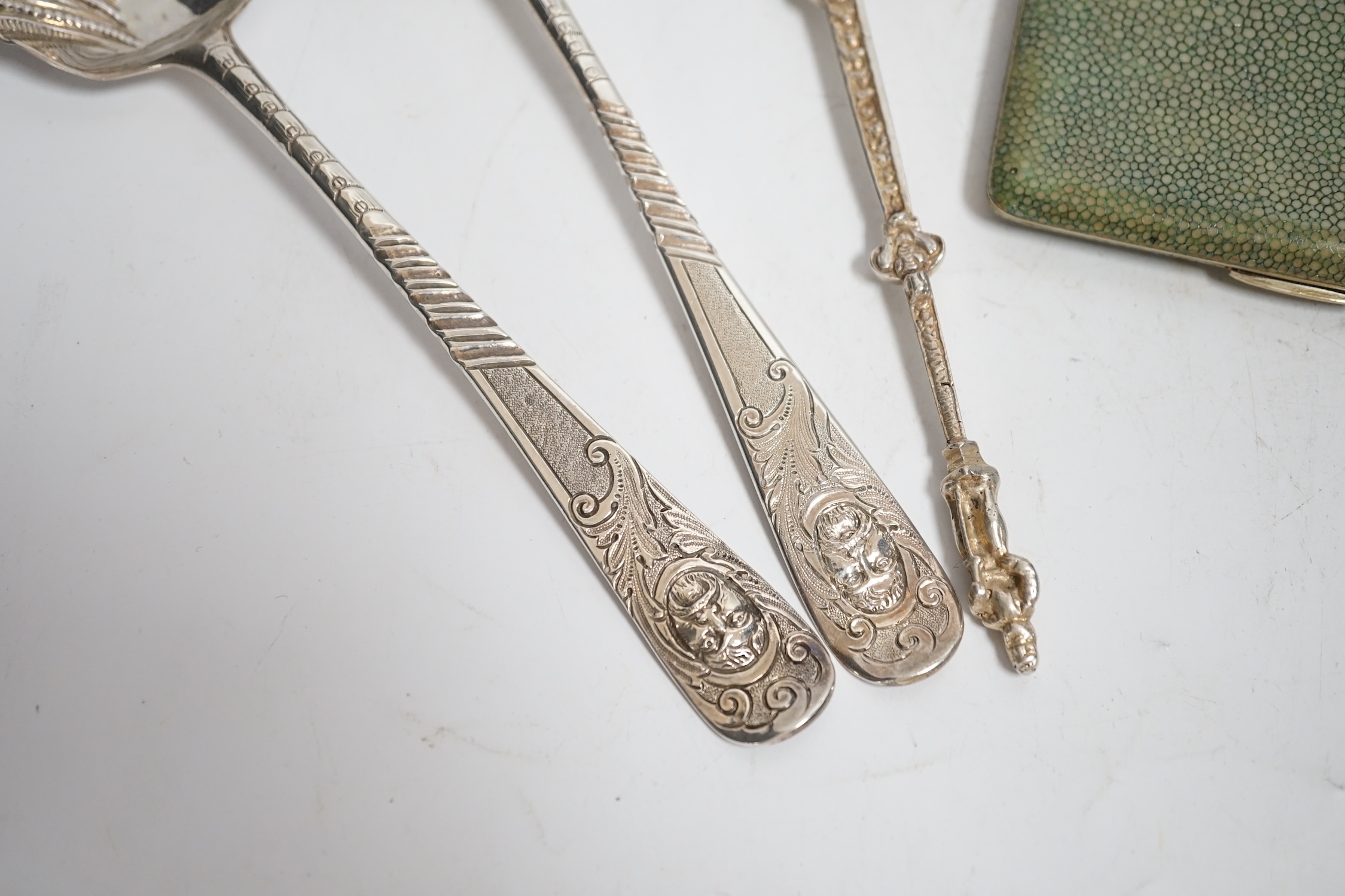 A George III Scottish provincial table spoon, with later decoration, Robert Keay I, Perth, circa 1790, 22.5cm, together with a George III silver table spoon with similar decoration, a continental white metal spoon and a